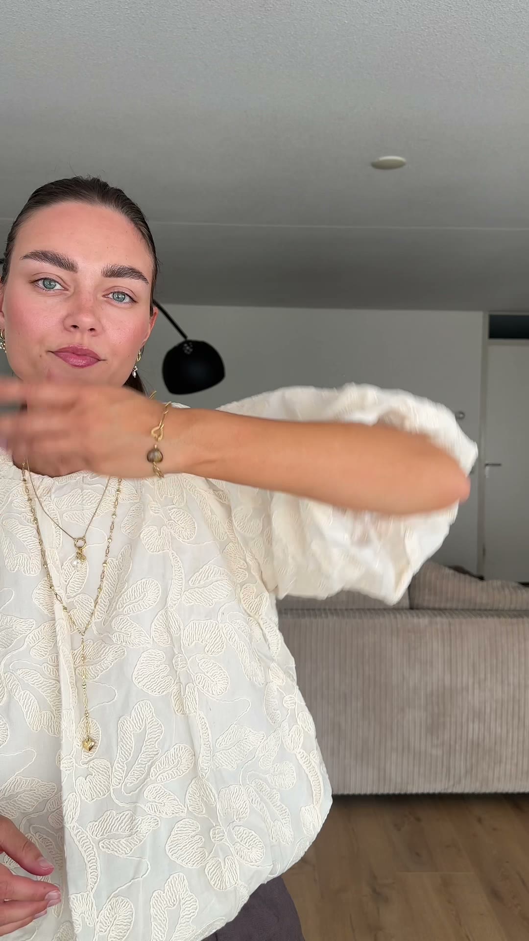 Sabine in a white blouse